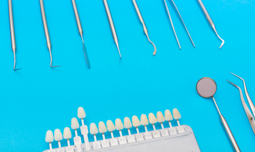 A dentist fixing porcelain veneers of a patient at Alatorre Dental of Las Vegas